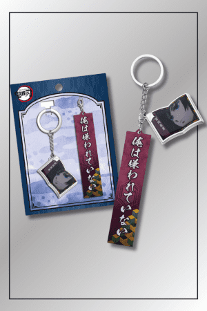 Close-up of Giyu Tomioka Demon Slayer keychain with Water Hashira portrait charm and white kanji water tag