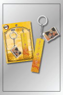 Zenitsu Agatsuma Demon Slayer keychain with yellow Japanese quote tag and anime portrait charm in official packaging