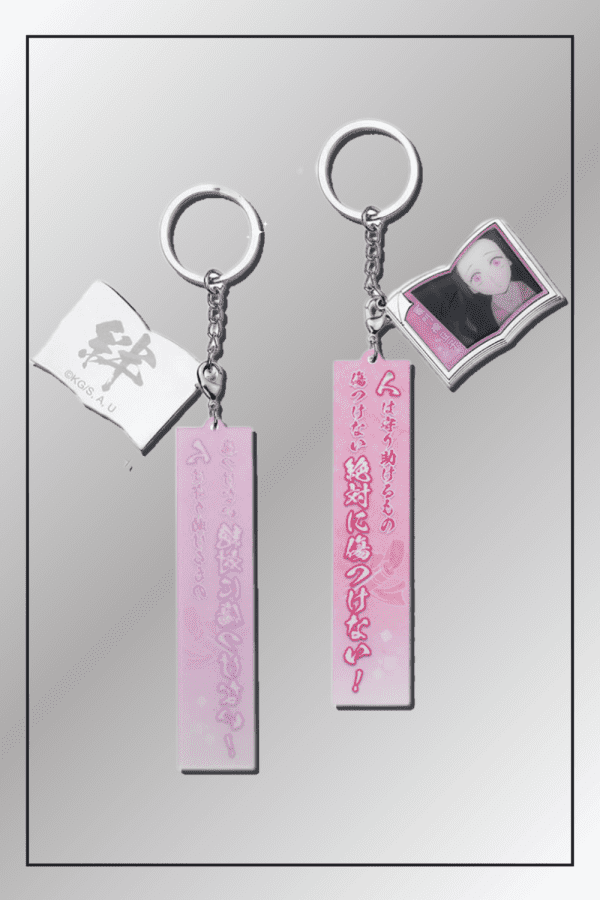 Nezuko Kamado Demon Slayer keychains with Japanese quote tags, kizuna kanji tag, and anime portrait charm