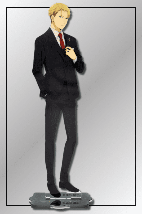 Loid Forger acrylic figure in black formal suit with red tie, standing on a decorative base.