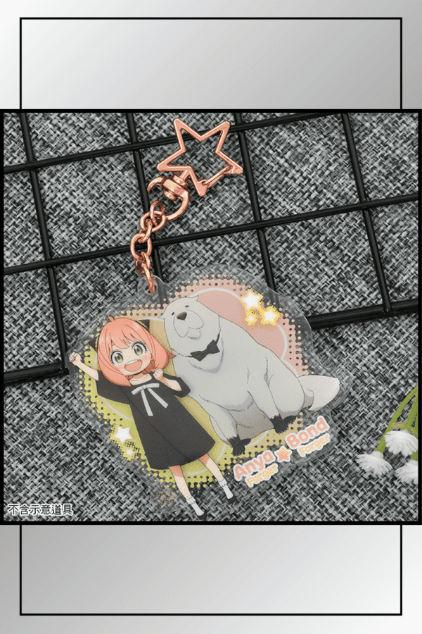 SPY x FAMILY Anya and Bond Forger acrylic keychain laid flat on a textured background