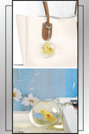 SPY x FAMILY liquid dome keychain shown on a tote bag and flat surface
