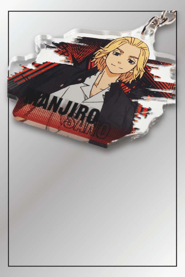 Close-up of Manjirou Sano keychain from Tokyo Revengers with red-black backdrop