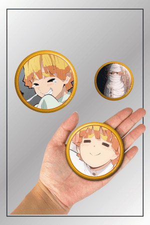 Demon Slayer 3-piece badge pin set featuring Zenitsu Agatsuma and Obanai Iguro with one pin shown in hand for size comparison
